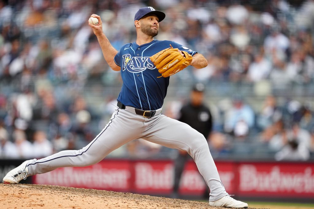 Tampa Bay Rays pitcher and Fordham alumnus Nick Martinez in mid-motion delivering a pitch from the pitcher's mound during a baseball game at Yankee Stadium.