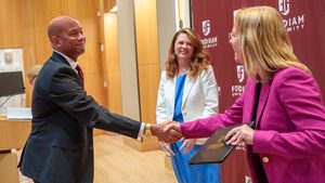 Faculty Celebrate Promotions and Tenure Among Family and Friends